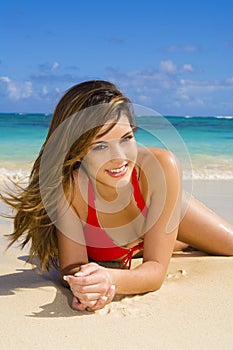 Woman in a bikini at a tropical beach