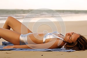 Woman in bikinis sunbathing