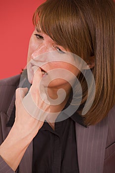 Woman biting her nails