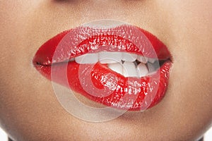 Woman Biting Red Lips photo