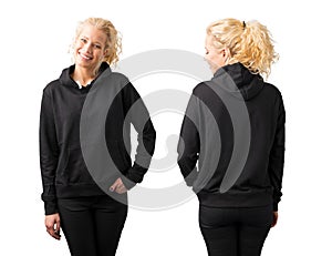 Woman in black blank hoodie on white background