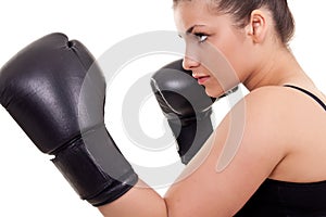 Woman with black boxing gloves