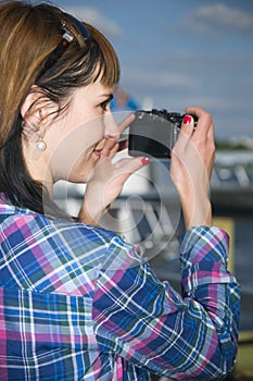 Woman with black camera