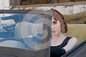 Woman in a black car