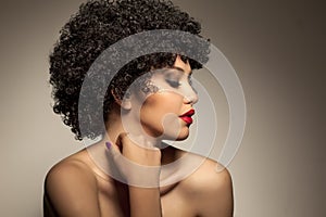 Woman with black curly wig