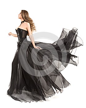 Woman Black Dress Flying on Wind, Beautiful Fashion Model in Fluttering Chiffon Gown on White