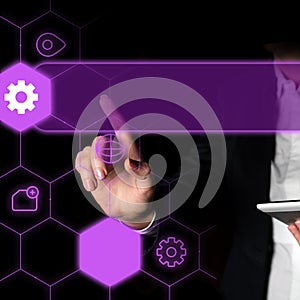 Woman in black office suit standing and pressing virtual button with her finger. Futuristic digital design with colored