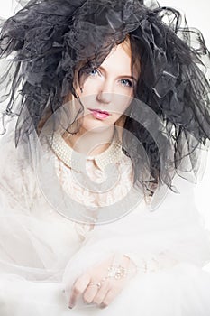 Woman with a tulle headpiece photo