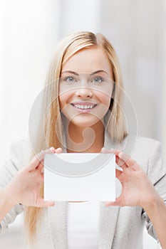 Woman with blank business or name card