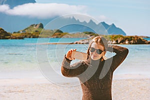 Woman blogging taking photo by smartphone camera capturing moments girl traveling alone