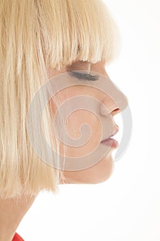 Woman blond side head eyes closed