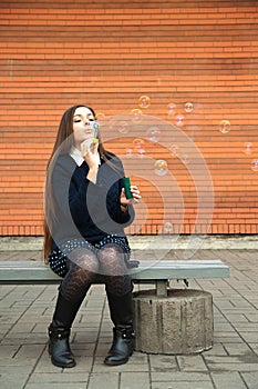 Woman blow bubbles