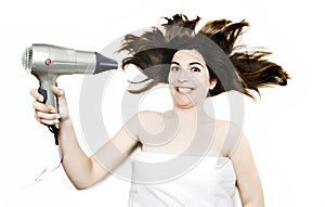 Woman Blow Drying Hair