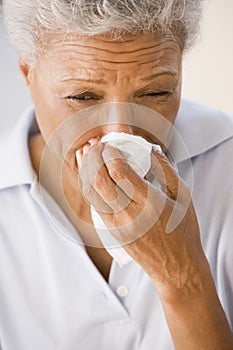 Woman Blowing Her Nose