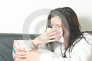 Sneezing woman photo