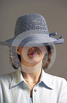 Woman with blue hat