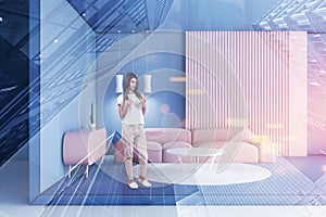 Woman in blue and pink living room interior