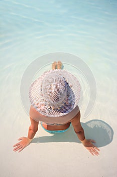 Woman in blue pool