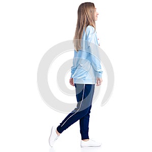 Woman in blue sweatpants sport style casual goes walking