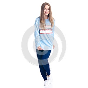 Woman in blue sweatpants sport style casual standing looking smiling