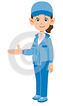 A woman in blue work clothes introducing the right side