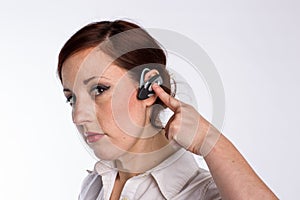 Woman with Bluetooth Headset