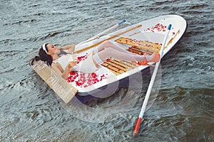 Woman in a boat outdoors