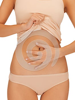 Woman body in beige cotton undrewear