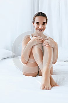 Woman Body Care. Girl With Soft Body Skin And Long Legs