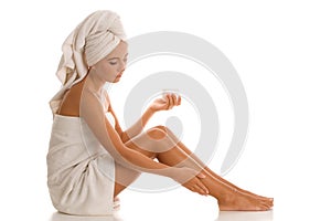 Woman with body lotion