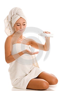 Woman with body lotion