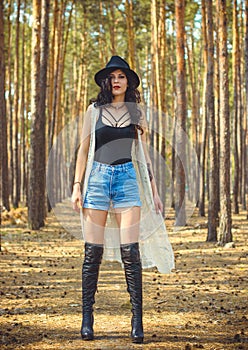 Woman in Bohemian style at forest