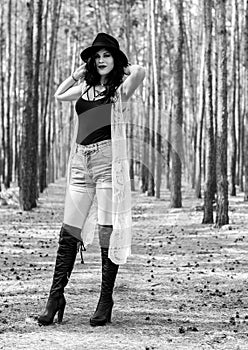 Woman in Bohemian style at forest