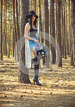 Woman in Bohemian style at forest