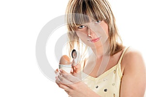 Woman with boiled egg