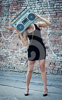 Woman with boom box face