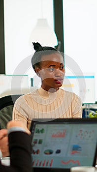 Woman boss leader discussing new project using paperwork