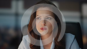 Woman boss thinking face at evening cabinet closeup. Businesswoman pondering