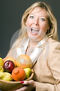 Woman with bowl of fruit