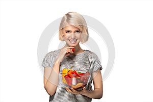 Woman with bowl of vegetables