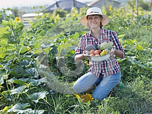 Woman with a bowl of vegetables