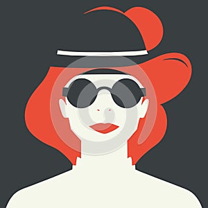 Woman with bowler hat and sunglasses