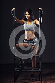 Woman boxer sitting on chair