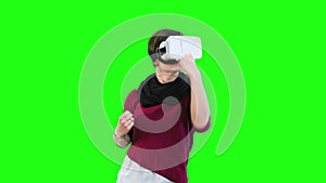 Woman Boxing with a VR Headset On.