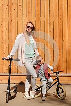 Woman with boy with bicycles