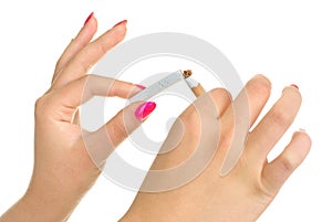 Woman breaking a cigarette