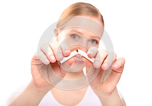 Woman breaking cigarette. concept stop smoking