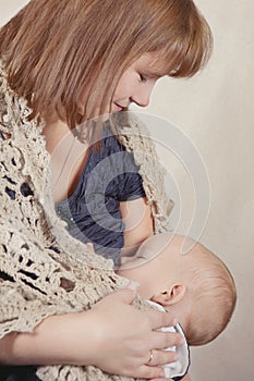 Woman breast feeding baby