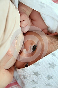 Woman breastfeeding baby stock photo