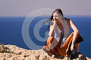 Woman breathing by the sea